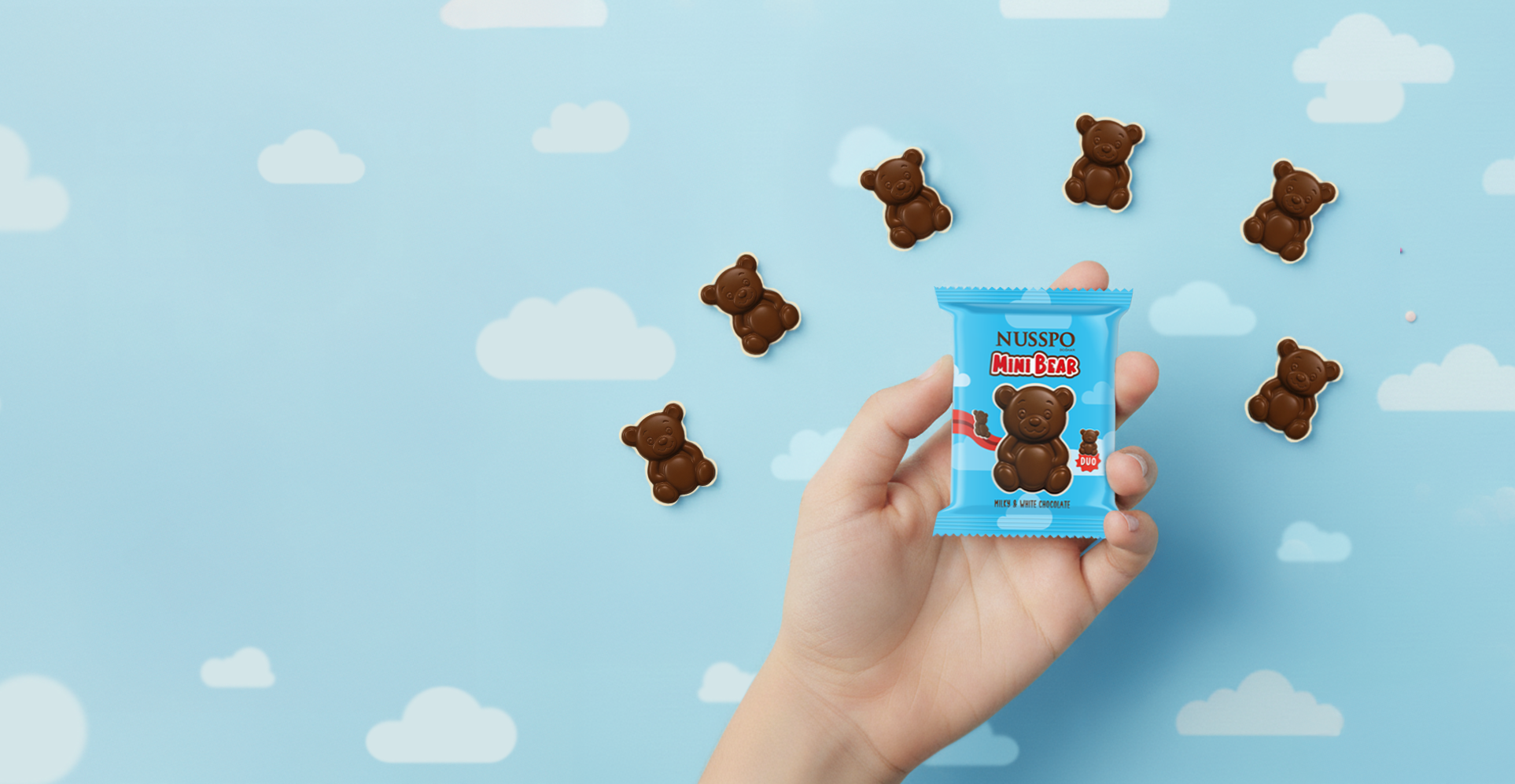 Ourson en chocolat au lait et chocolat blanc 16 g | Nusspo